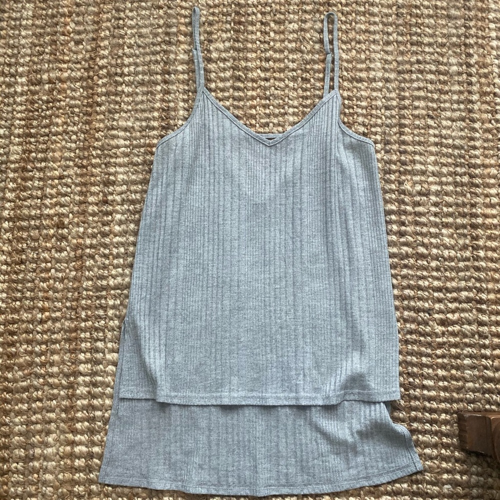Asymmetric hem cami